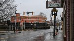 NS 4206 passing through downtown with an Auto train